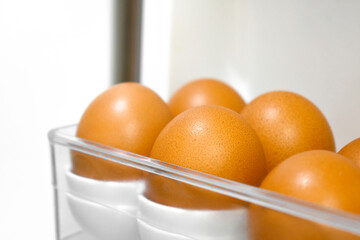 Eggs in the refrigerator. Selective focus.