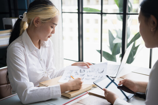 Interior designers brainstorming creative furniture design ideas in collaborative meeting - Powered by Adobe