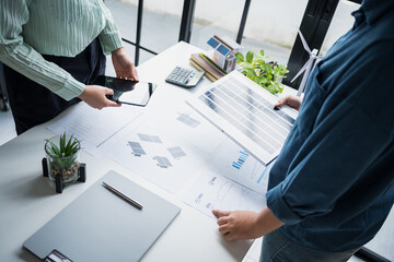 Solar panels green energy Business people working in green eco friendly office business meeting...