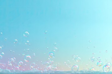 Pastel soap bubbles against a light blue sky
