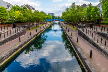 A view looking down a side canal beside the Detroit Bridge in Salford Quays,  Manchester,UK in...