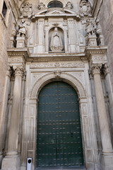 Exploring the intricate facade of Santa Iglesia Catedral in Jaen, Andalucia, showcasing historical architecture and craftsmanship