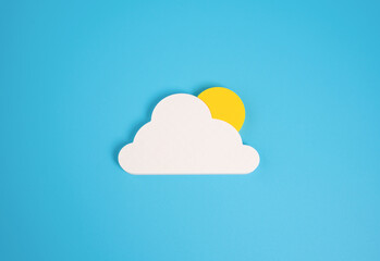 Sun behind the cloud, minimalistic concept. Weather, partly cloudy. Changing weather, partly sunny...
