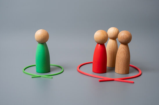 The person is in the minority on the issue. Social isolation, dissenting views, or underrepresented voices. Resistance, alternative thinking, or being excluded from the majority opinion.