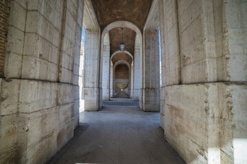 Exploring the stone arches of Church of San Antonio in Aranjuez, Madrid by the Palace of Aranjuez