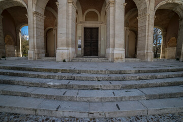 Exploring the historic Church of San Antonio with stone arches and walkways at the Palace of...