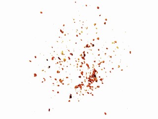 Sprinkle of chopped hot red chili peppers or paprika, paprika or red chili powder isolated on white background. Dry paprika powder spice. Pile of crushed red chili peppers or paprika.