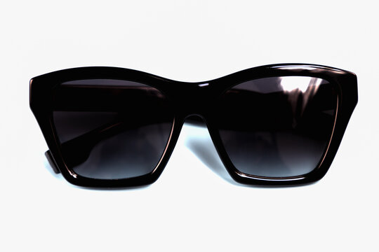Black fashion sunglasses on white background