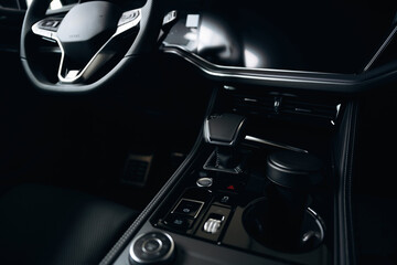 Front panel with steering wheel. Interior of the modern car, close up view