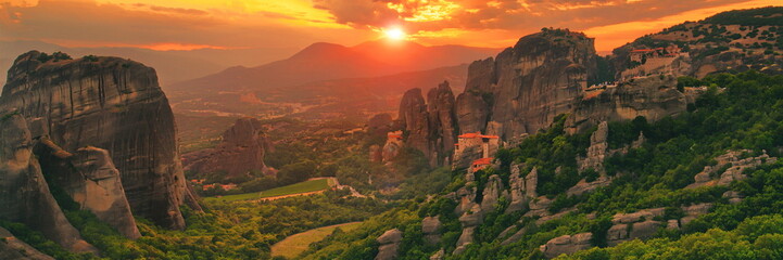 Beautiful sunset over the Rousanou Monastery in Meteora, Greece, Europe - 3:1 panorama