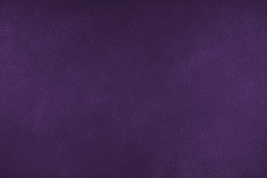 Abstract grungy texture background with different shades of dark matte purple color. Painted canvas, concrete surface, studio backdrop, grainy textured effect