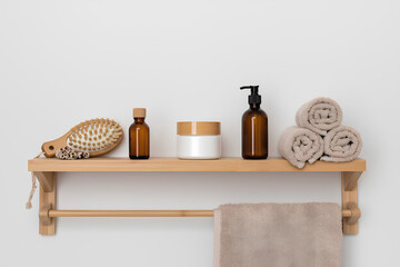 Collagen supplement jar in Scandinavian-style bathroom — white tiles, bamboo brush, candle