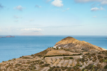Scenic view of hills and sea on Milos island, Greece