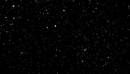 Obraz premium Scattered light particles on black background