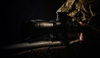 closeup face of a soldier aiming his target in darkness, war consept in hyper realistic illustration