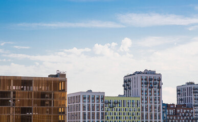 Modern residential buildings high-rise buildings on a sunny day. Construction of new residential...