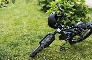 Bike and safety helmet outdoors. Active sport. Protection. Life insurance and children's safety.