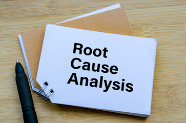 Root Cause Analysis notepad with marker on desk
