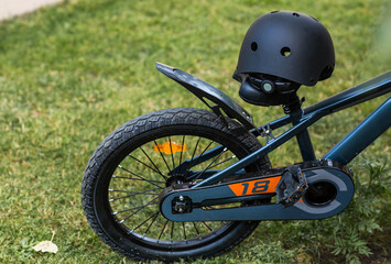 Bike and safety helmet outdoors. Active sport. Protection. Life insurance and children's safety.