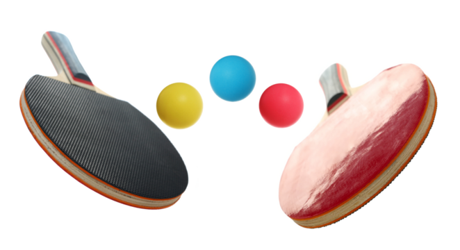Two ping pong rackets in duel with colorful balls flying, isolated on white background, sport, clipping path