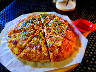 Delicious cheesy pizza slices, perfectly seasoned and ready to eat. Ideal for food blogs,...