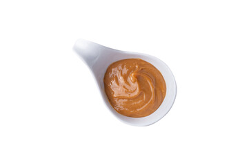 Doce de leite, traditional brazilian creamy milk sweet isolated over white background