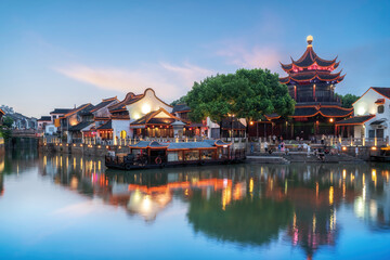 Scenic view of traditional Chinese architecture by the water