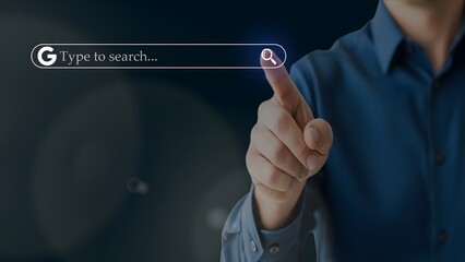 Man in blue shirt touching virtual search bar interface, futuristic online browsing and digital...
