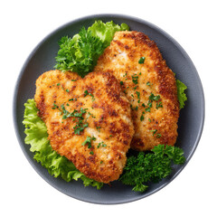 Golden breaded chicken cutlets with fresh greens on a plate isolated on transparent background