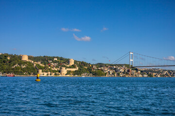Fototapeta premium Rumeli Fortress and Bosphorus Bridge over Blue Waters – Istanbul View