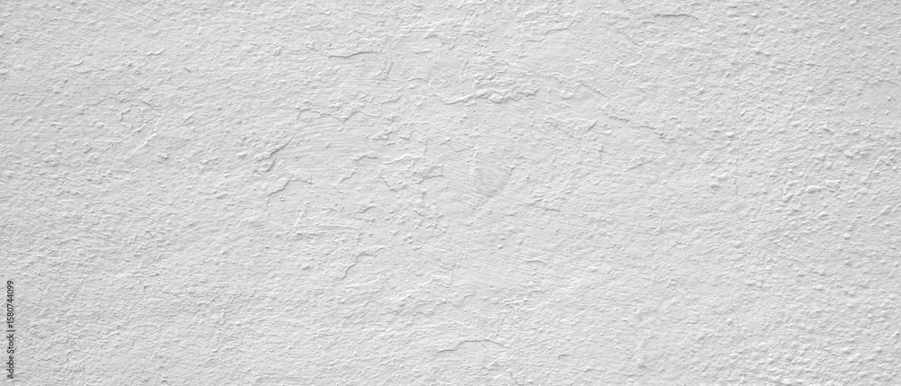 Poster white wall with a rough texture. wall is covered in white paint. wall is not very smooth as white te