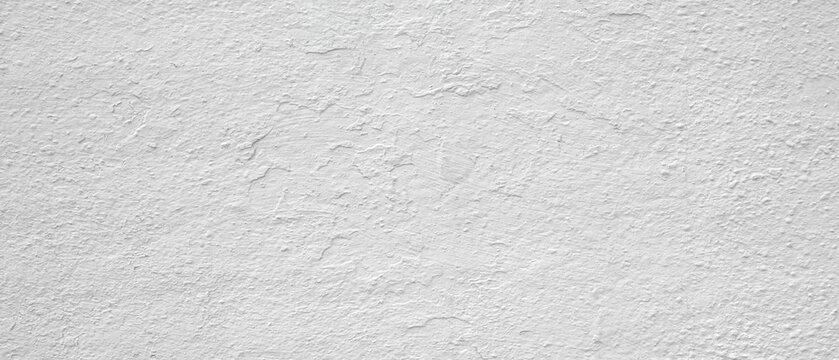 White wall with a rough texture. wall is covered in white paint. wall is not very smooth as white textured background web banner template page design
