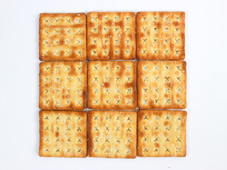 isolated square sweet cracker with sprinkled sugar on top on white background