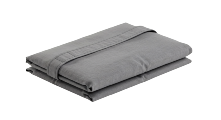 Folded gray bedsheets against a black background.
