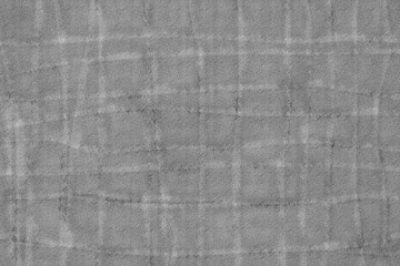 Fototapeta premium Aged black fabric and leather textures create a rough, grunge textile surface with a vintage grey and brown pattern suitable for a wallpaper backdrop