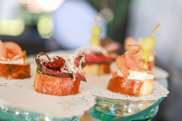 Appetizers with meat and bacon.