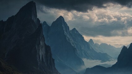 Fototapeta premium A striking photograph reveals imposing mountain spires shrouded in atmospheric mist and dark clouds