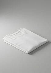 Pristine White T-Shirt Folded Neatly on a Grayscale Background