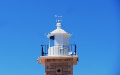Lighthouse with markings four sides of the world