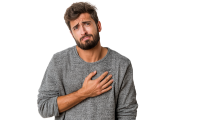 Young man with a pained expression, holding his chest in a distressed pose, white isolated background.