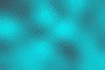 Soft Blue turquoise foil glass texture background. Abstract gradient bright light reflection and shiny rough texture surface. Glass effect background