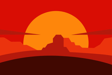 sunset over a red rock desert mesa