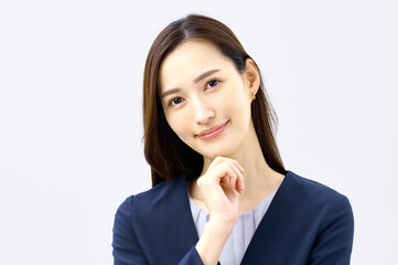 考えるビジネスウーマン　スーツの女性