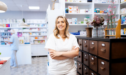 Portrait of female pharmacist in drugstore.