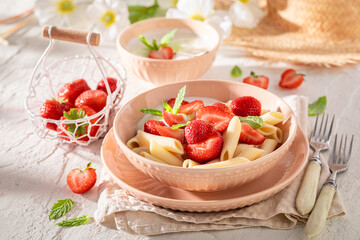 Delicious and fresh pasta with strawberries and yogurt.