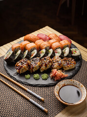 Sushi set served on black slate