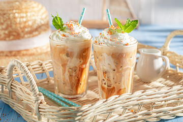Sweet ice coffee in summer sunny day.