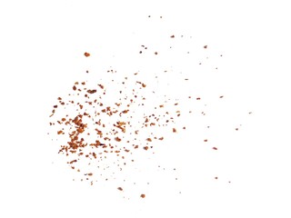 Sprinkle of chopped hot red chili peppers or paprika, paprika or red chili powder isolated on white...