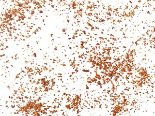 Sprinkle of chopped hot red chili peppers or paprika, paprika or red chili powder isolated on white background. Crushed red chili or chopped paprika. A pile of ground red chili or paprika.