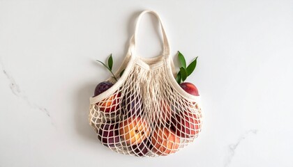 Plums and Peach in a Beige Mesh Produce Bag